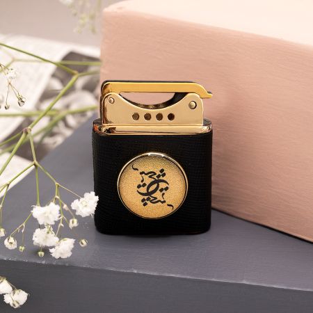 فندک روکش طلا طرح هیچ 2 چرم هرمس