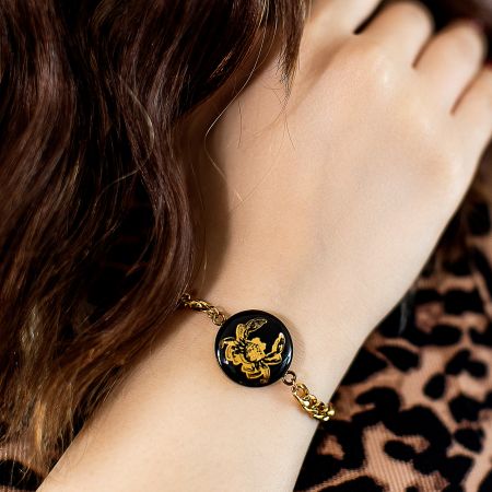 دستبند روکش طلا ماه تولد تیر سری رویال