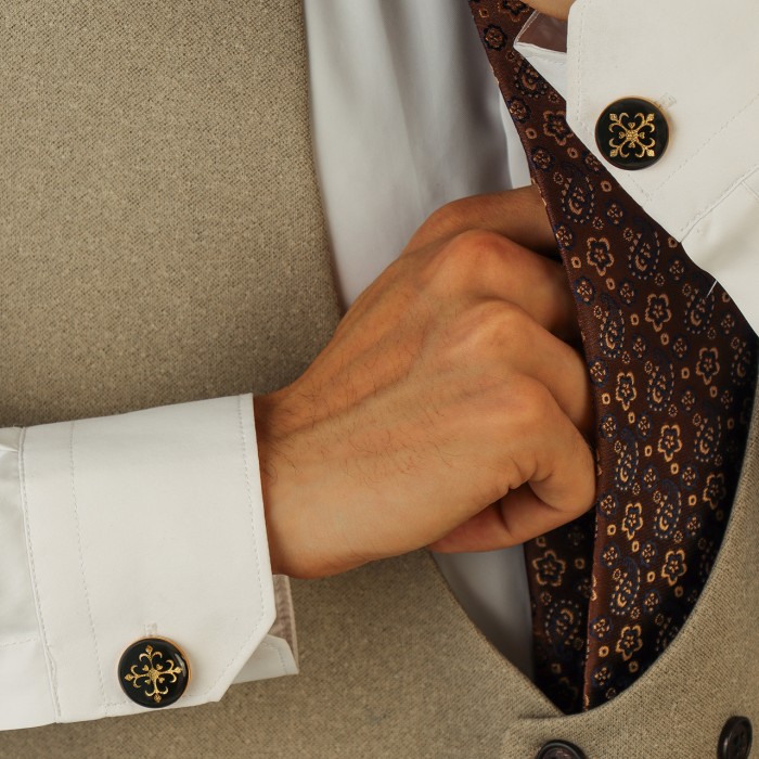 دکمه سردست روکش طلا طرح مانی