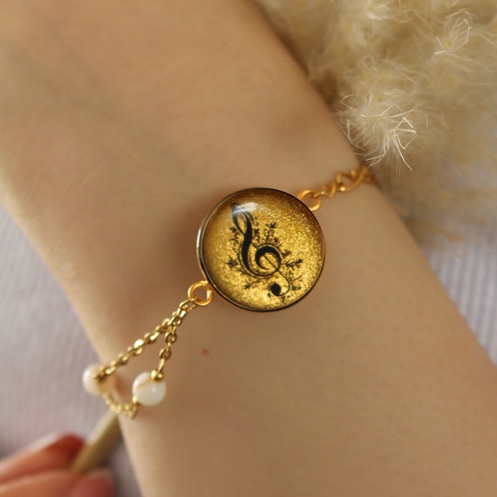 دستبند دخترانه روکش طلا طرح نت سل