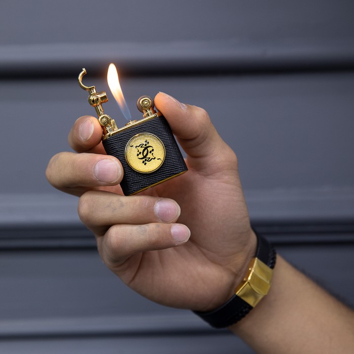 ست چرم هرمس روکش طلا طرح هیچ (دستبند چرم ، جاکلیدی و فندک) 