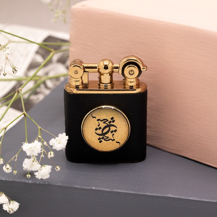 ست چرم هرمس روکش طلا طرح هیچ (دستبند چرم ، جاکلیدی و فندک) 