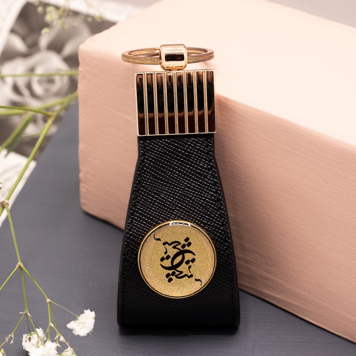 جاکلیدی چرم روکش طلا طرح هیچ 2 چرم هرمس